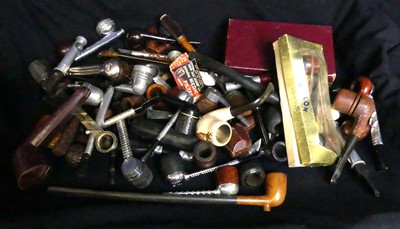 Lot 87 - A tray of various pipes and smoking...