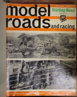 Lot 1516 - A folder containing a quantity of model roads...