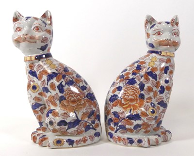 Lot 108 - A pair of reproduction stoneware Imari cats, h....