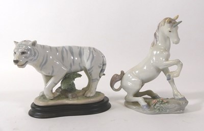 Lot 116 - A Lladro porcelain tiger, No.C5M, on wooden...