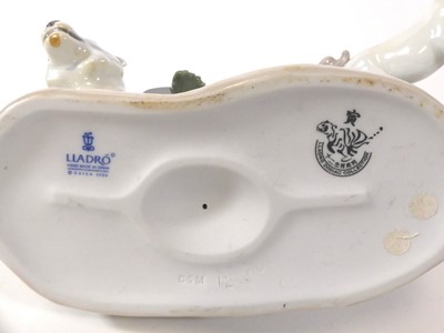 Lot 116 - A Lladro porcelain tiger, No.C5M, on wooden...