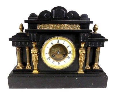 Lot 204 - A late 19th century black slate mantel clock,...