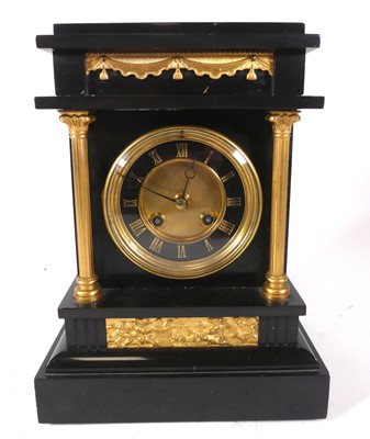 Lot 140 - A late Victorian polished black slate and gilt...