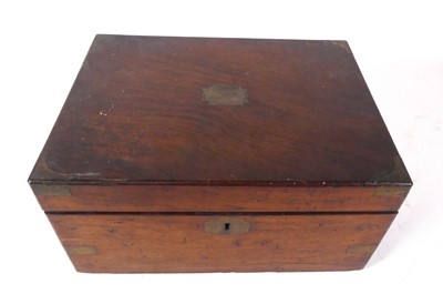 Lot 146 - A Victorian walnut and brass bound fitted...