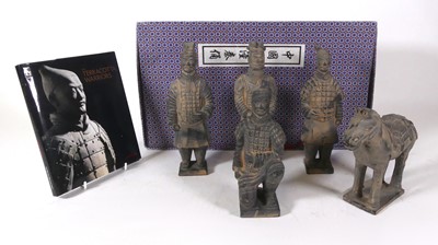 Lot 154 - A reproduction boxed set of five terracotta...