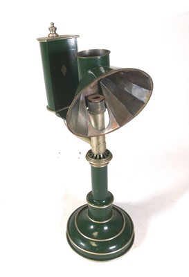 Lot 210 - An early 20th century green painted table lamp,...