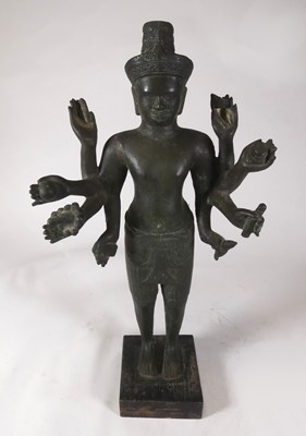 Lot 213 - A Thai verdigris metal figure of a deity,...