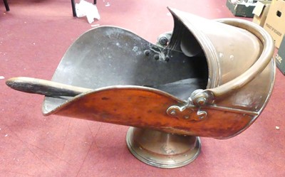 Lot 249 - A 19th century copper helmet shaped coal...