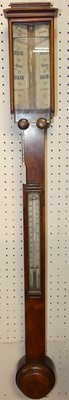 Lot 1142 - A Victorian figured walnut two-dial stick...