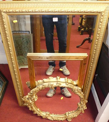 Lot 1092 - A Rococo style gilt composition framed oval...