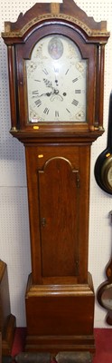 Lot 1145 - A circa 1800 provincial oak long case clock,...