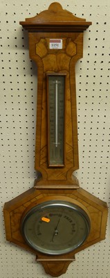 Lot 1151 - An Art Deco figured walnut and cross-banded...