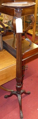 Lot 1196 - An early 20th century mahogany plant stand,...