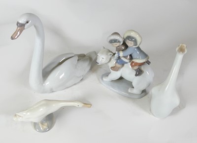 Lot 276 - A Lladro porcelain figure group of two Eskimo...