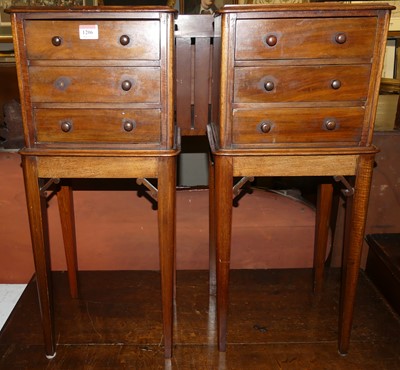 Lot 1206 - A pair of mahogany round cornered three-drawer...