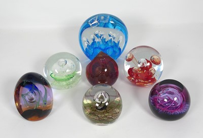 Lot 279 - A group of four Caithness glass paperweights,...