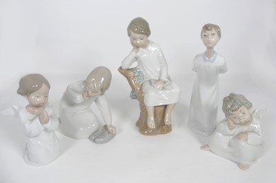 Lot 281 - A group of five Lladro porcelain figures, to...