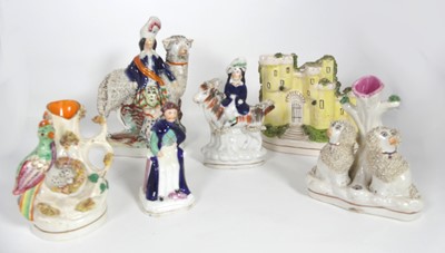 Lot 304 - A collection of Staffordshire pottery items,...