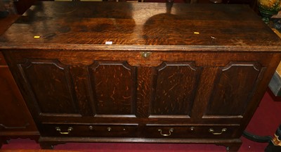 Lot 1239 - An 18th century joined oak four panelled hinge...