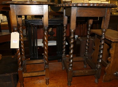 Lot 1244 - Two barley twist turned oak piecrust topped...