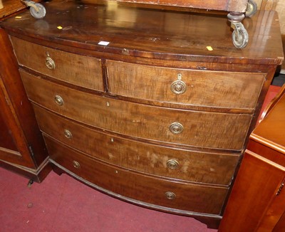 Lot 1248 - A 19th century mahogany bow front chest of two...