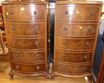 Lot 1269 - A pair of walnut and figured walnut bow front...