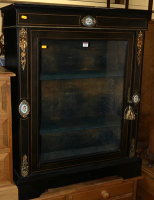 Lot 1275 - A mid-19th century ebonised, gilt metal...