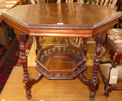 Lot 1278 - An Edwardian walnut octagonal two-tier...