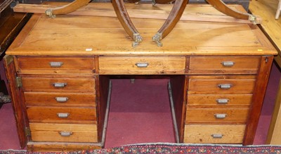 Lot 1285 - A rustic stained pine twin pedestal writing...