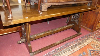 Lot 1289 - A Victorian Gothic revival oak refectory table,...