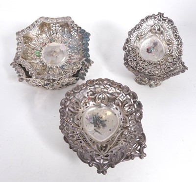 Lot 392 - A set of four Victorian silver bonbon dishes,...