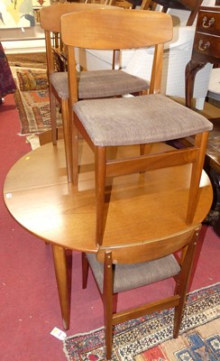 Lot 1291 - A 1960s teak dining suite, comprising; D-end...