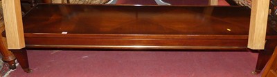 Lot 1295 - A contemporary mahogany long low coffee table,...