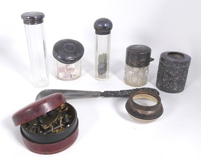 Lot 403 - A collection of cut glass dressing table jars,...