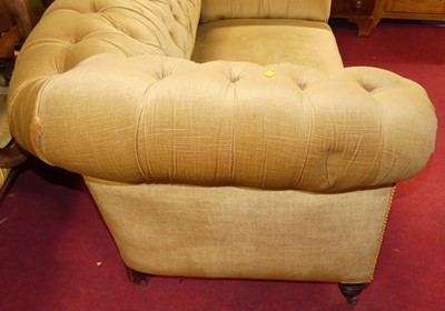 Lot 1337 - A circa 1900 pale green fabric buttoned...