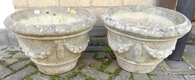 Lot 1414 - A pair of reconstituted stone circular...