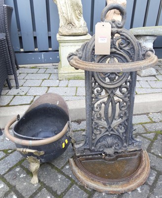 Lot 1425 - A Victorian cast iron demi-lune stick stand,...