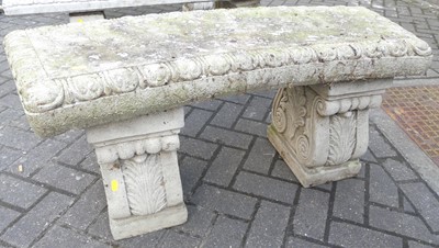 Lot 1431 - A reconstituted stone garden two-seater...