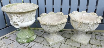 Lot 1434 - A pair of reconstituted stone pedestal leaf...