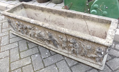 Lot 1437 - A reconstituted garden trough planter (broken...