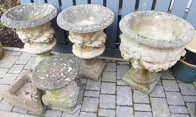 Lot 1439 - A pair of reconstituted stone pedestal garden...