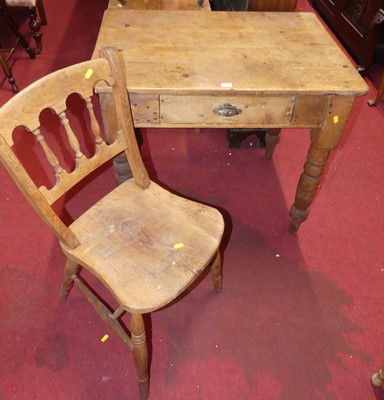 Lot 1349 - A rustic Victorian stripped oak single drawer...