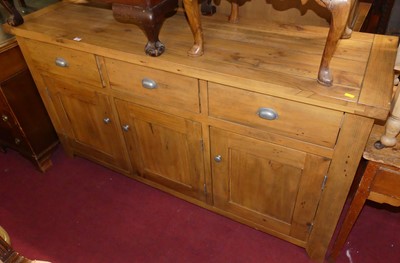 Lot 1353 - A contemporary stained pine sideboard, having...