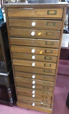 Lot 1368 - A circa 1900 beech bank of collectors drawers,...