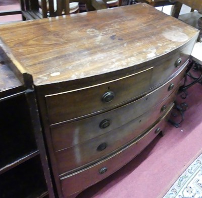 Lot 1375 - A Regency mahogany bowfront chest of two short...