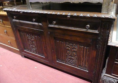 Lot 1384 - A joined and linenfold panelled oak double...