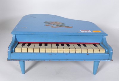 Lot 611 - A 1950s grand baby piano