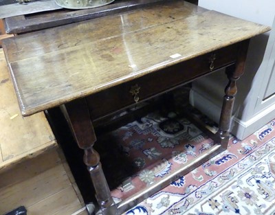 Lot 1391 - An 18th century provincial oak single drawer...