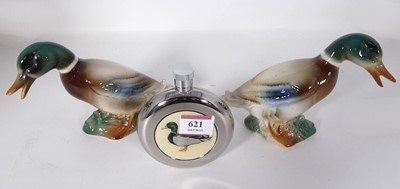 Lot 621 - A collection of duck ornaments, and a flask (3)