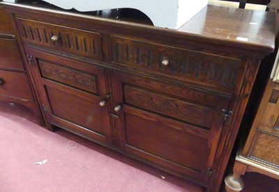 Lot 1399 - A Jaycee moulded oak double door side cupboard,...